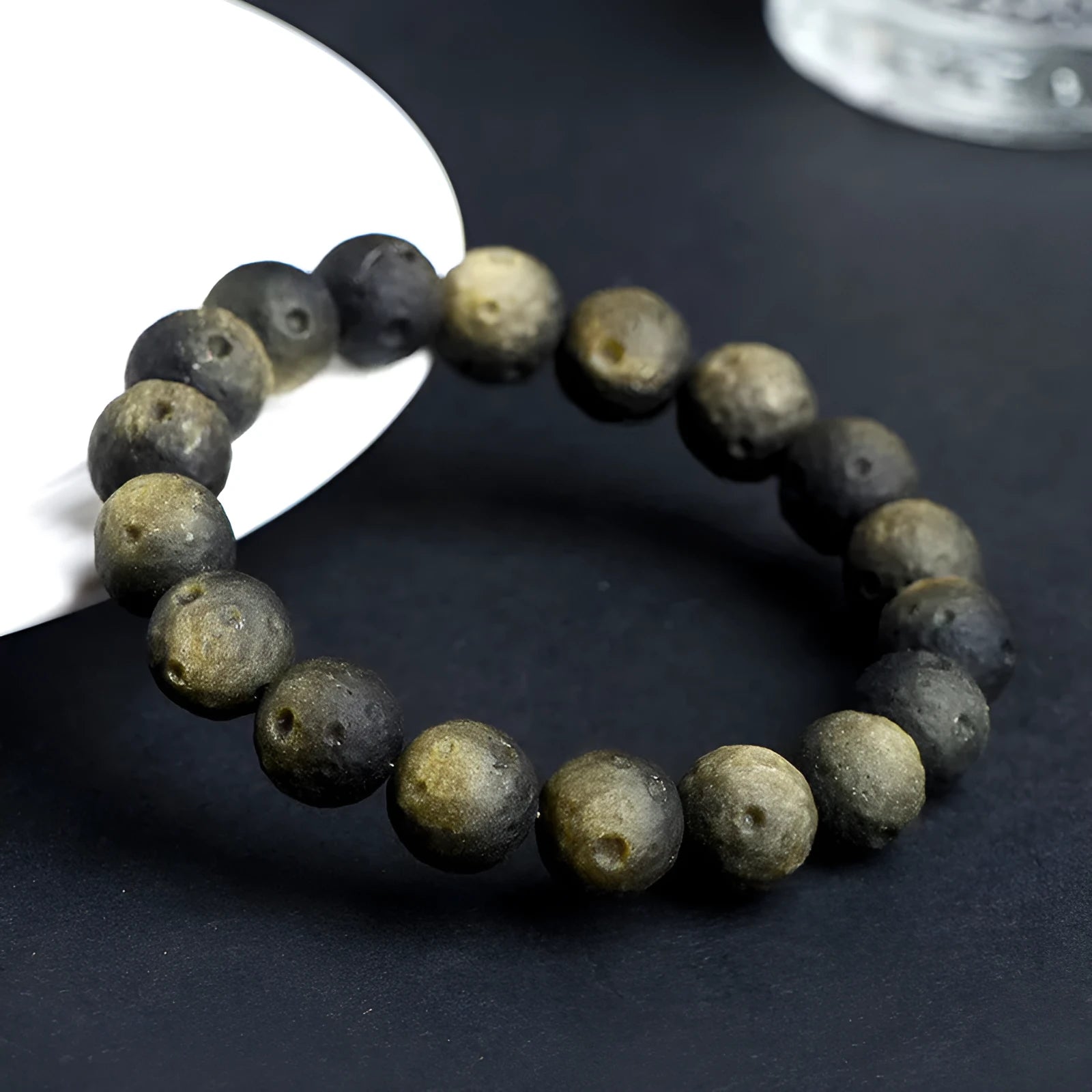 Obsidian crater ball bracelet with grinding texture in silver or gold meteorite finish
