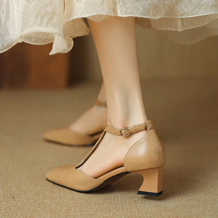 Wine red women's high heels with a square toe, chunky heel, buckle fastening, and visible stitching.