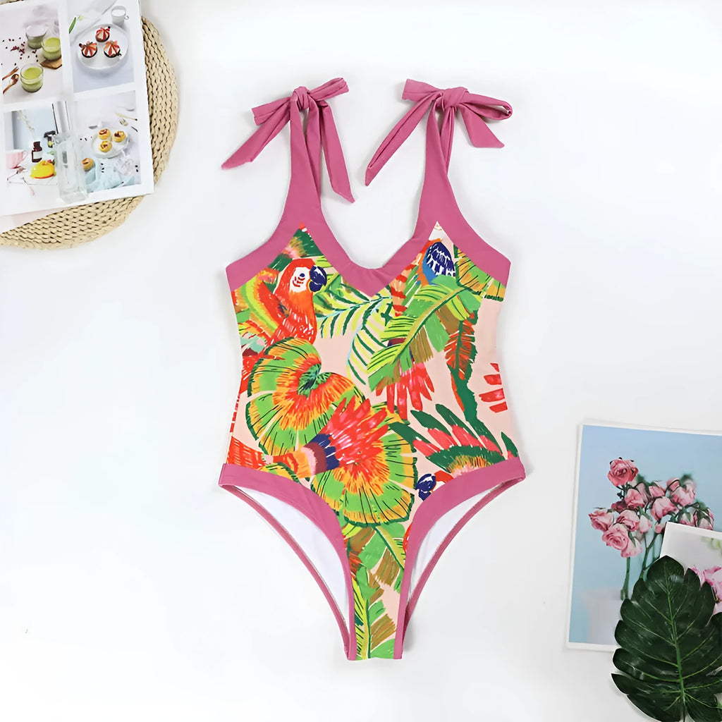 Retro pink floral print one-piece swimsuit with V-neck, covered belly, and thin skirt