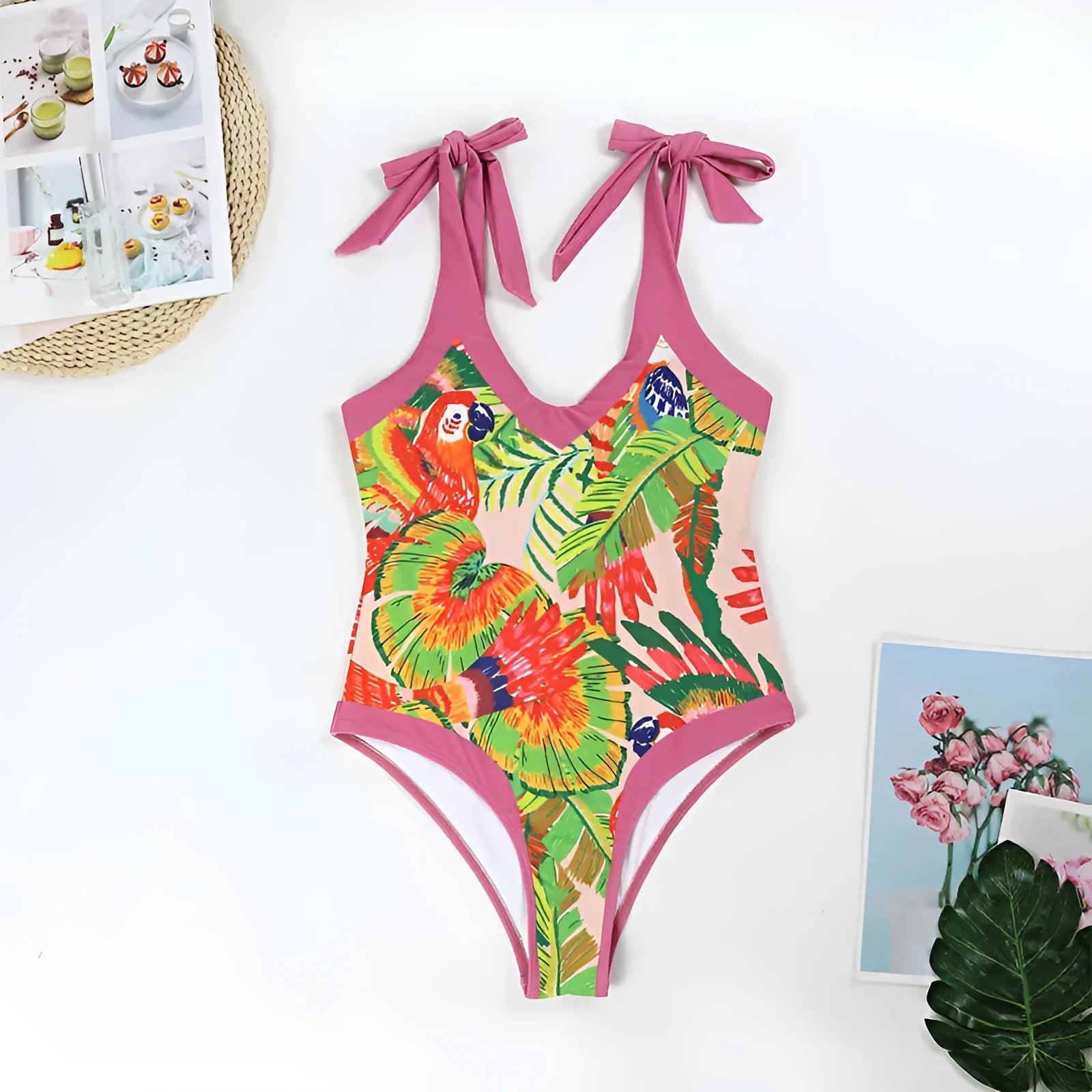 Retro pink floral print one-piece swimsuit with V-neck, covered belly, and thin skirt