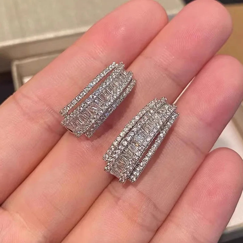 Geometric copper stud earrings with white gold plating and inlaid zircon stones
