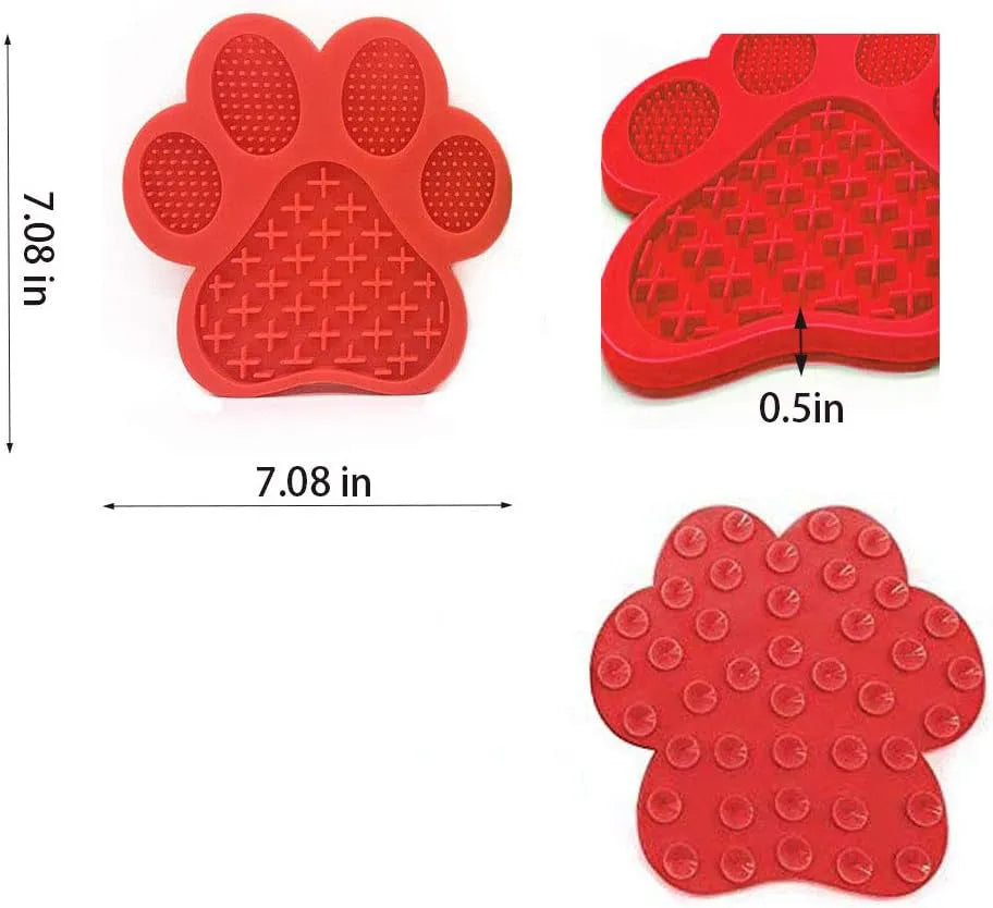 Blue bone-textured silicone dog licking mat with suction cups on a white tile wall