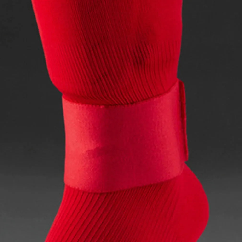 Football shin guard magic tape belt in red colour showing 25cm rubber strip