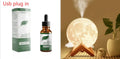 Spherical lunar humidifier night light with white LED lighting and USB charging cable