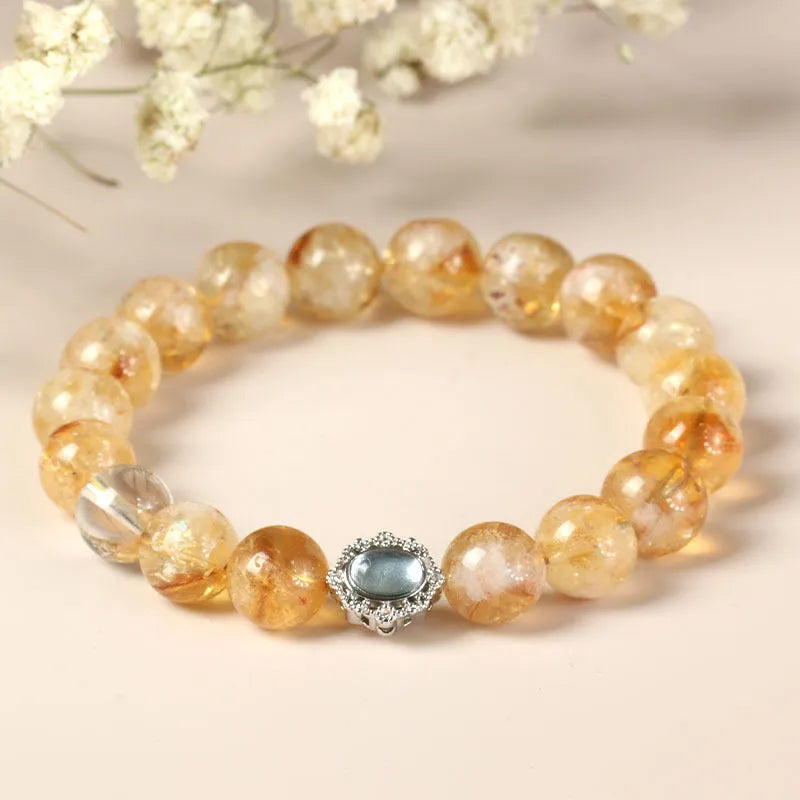 Citrine crystal bracelet with 10mm polished geometric beads on wrist