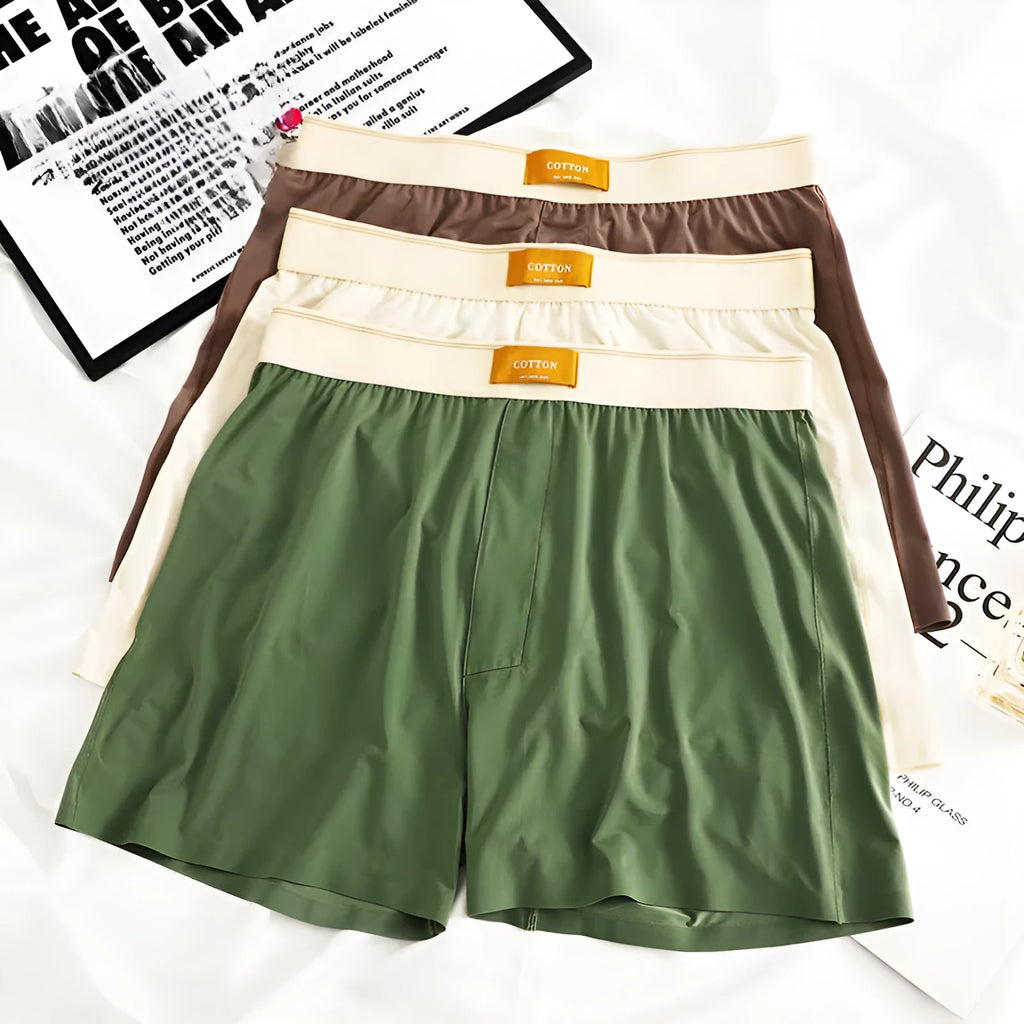 Pack of three men's solid colour ice silk underwear in loose fit mid waist design