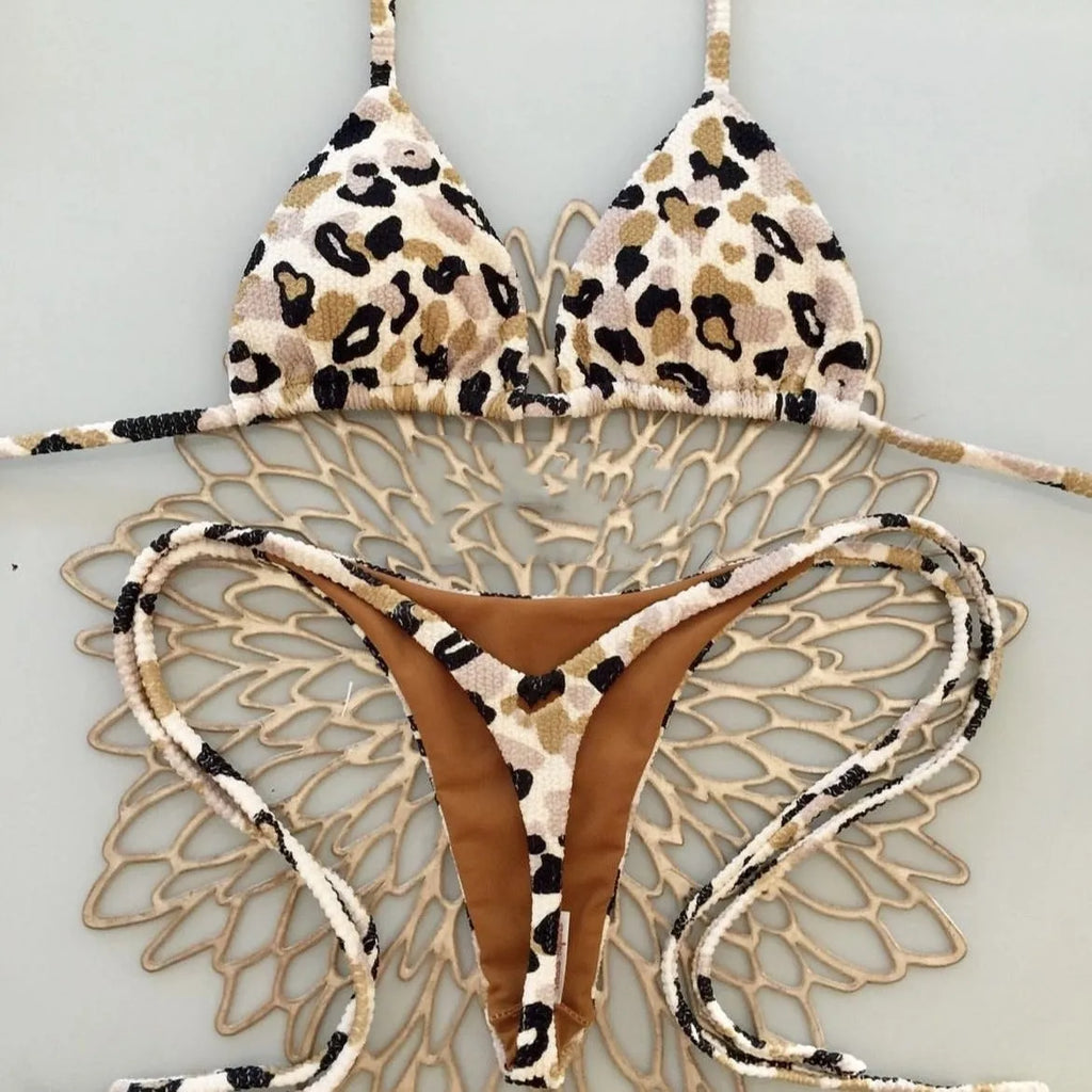 Women's printed beach bikini swimsuit with cotton lining on mannequin