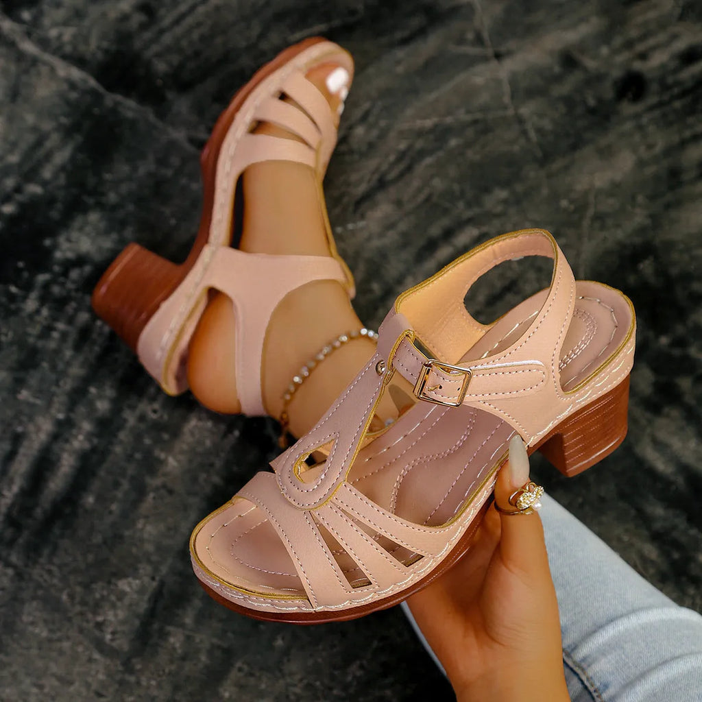 Women's peep toe wedge platform sandals in beige with a buckle strap on a PU leather upper.