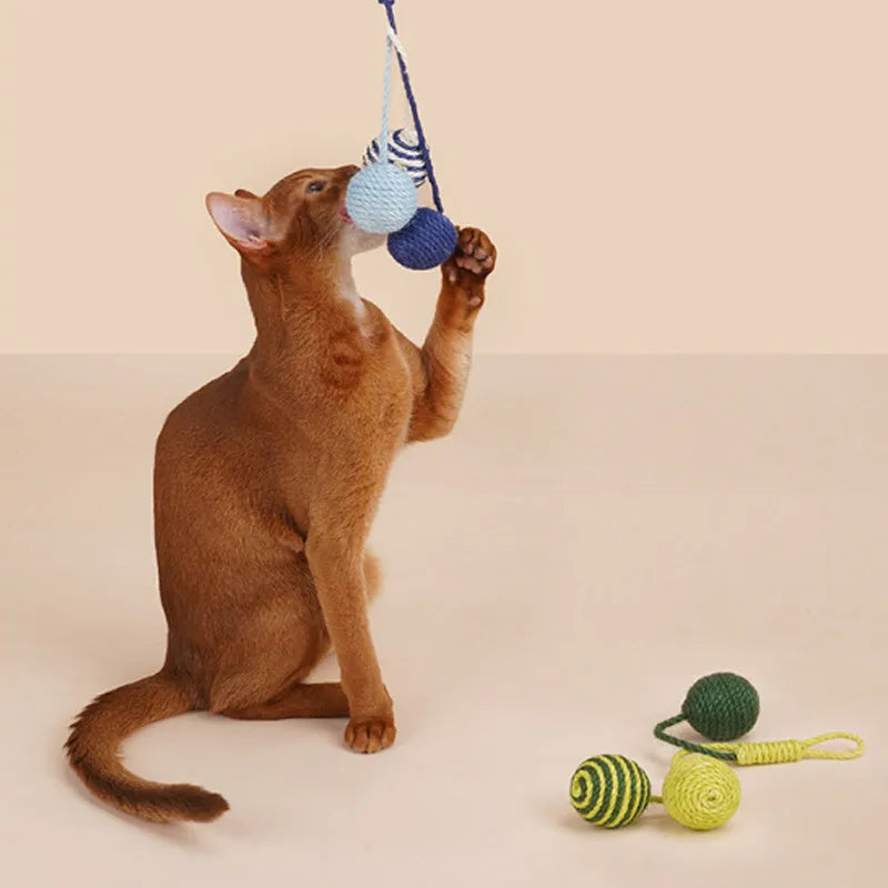 Cat teaser stick toy with catnip ball attachment, 255mm long with feather end.