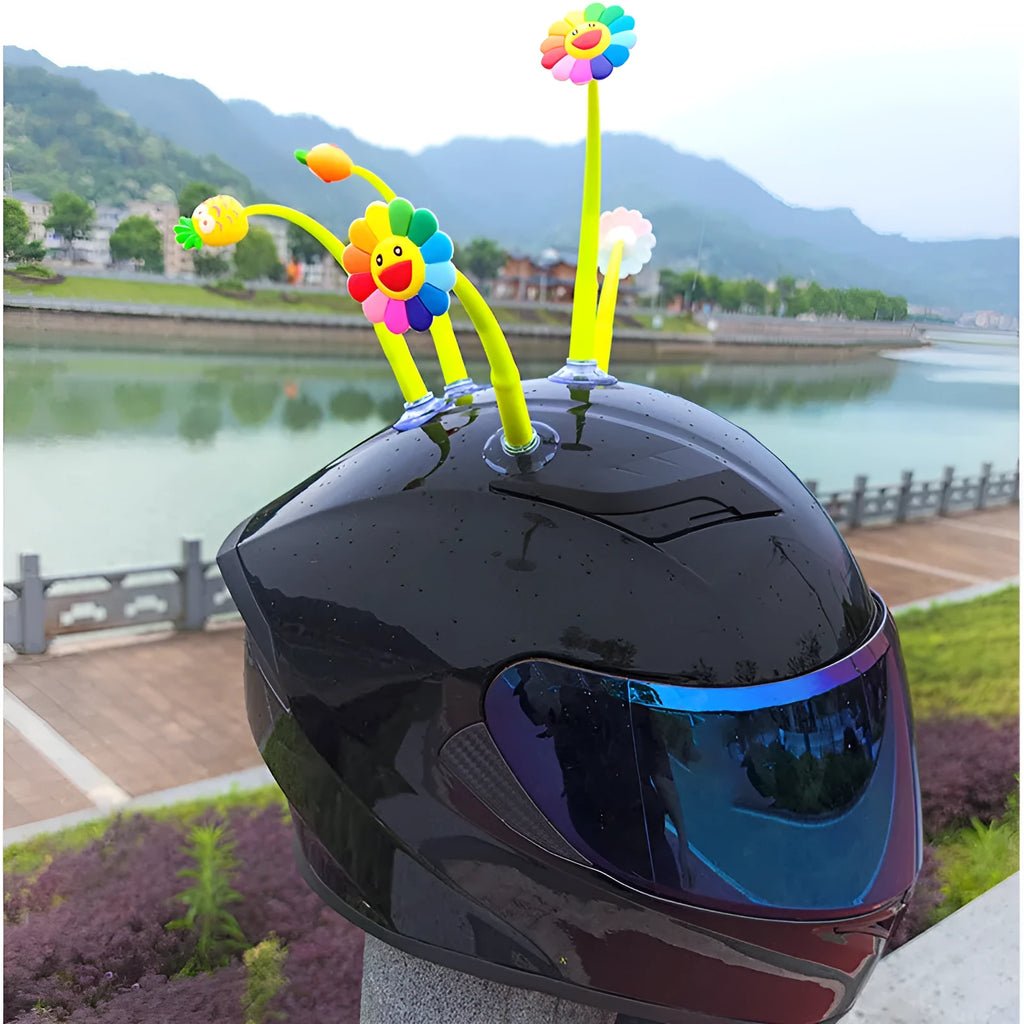 Swinging silicone sunflower decoration with suction cup for motorcycle or bicycle helmet.
