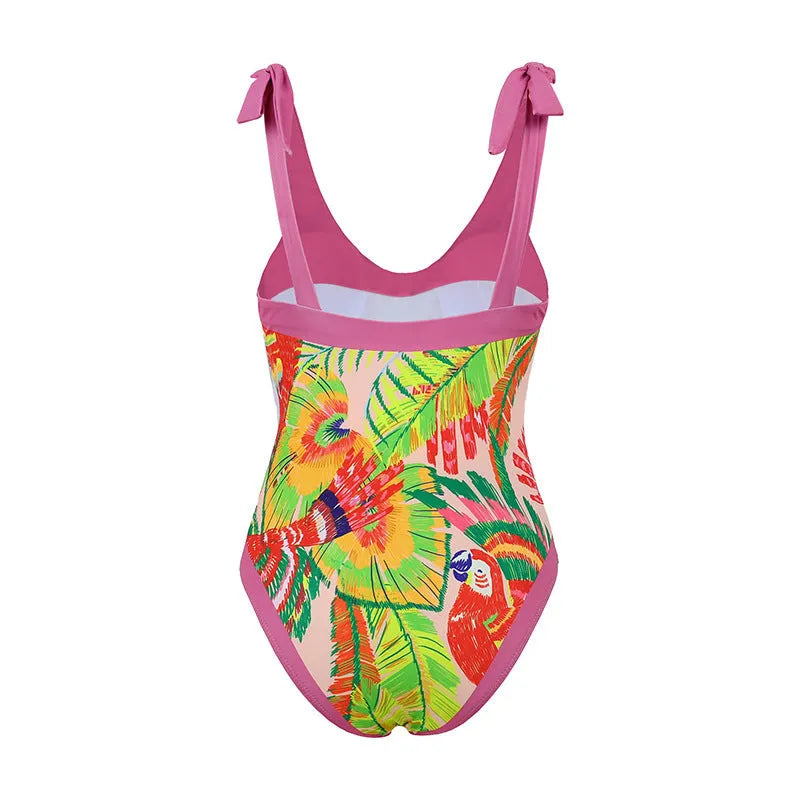 Retro pink floral print one-piece swimsuit with V-neck, covered belly, and thin skirt