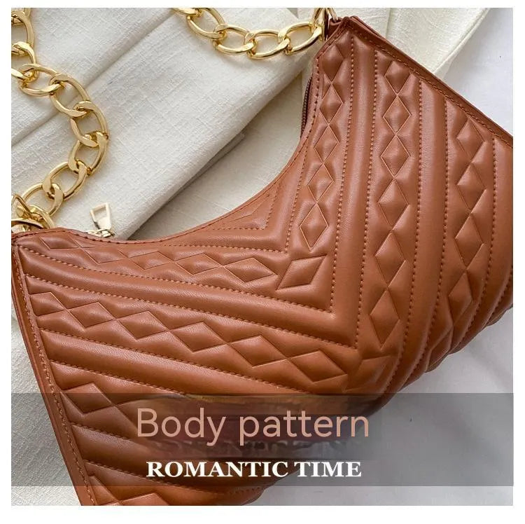 Black PU leather vertical square shoulder bag with chain strap, soft handle, and 3D outer pockets