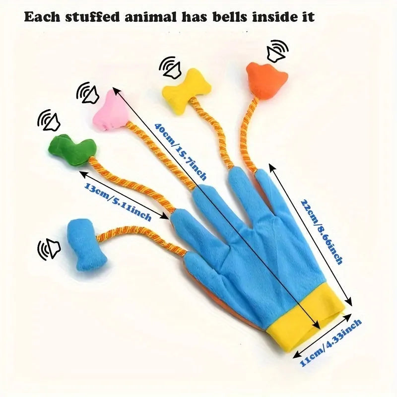 Yellow and blue plush cat toy with magic glove attachment and integrated bell, shown next to measurement scale