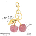 Zinc alloy key ring pendant with three-dimensional cherry design in pink colour