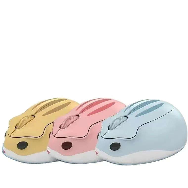 Hamster Bluetooth wireless mute computer mouse in yellow, pink, and grey colour options on a desk.