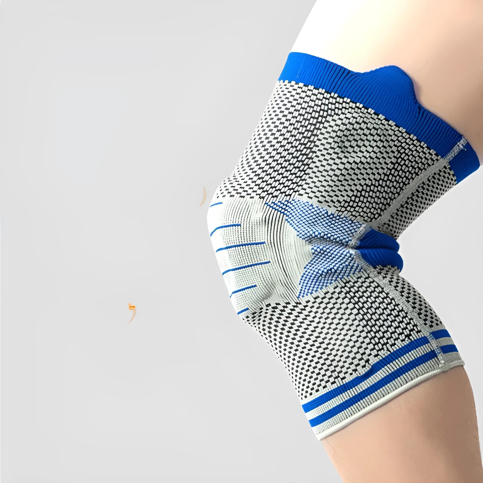 Cotton knee pad with silicone massage spring bar shock absorber in black and blue colour combination