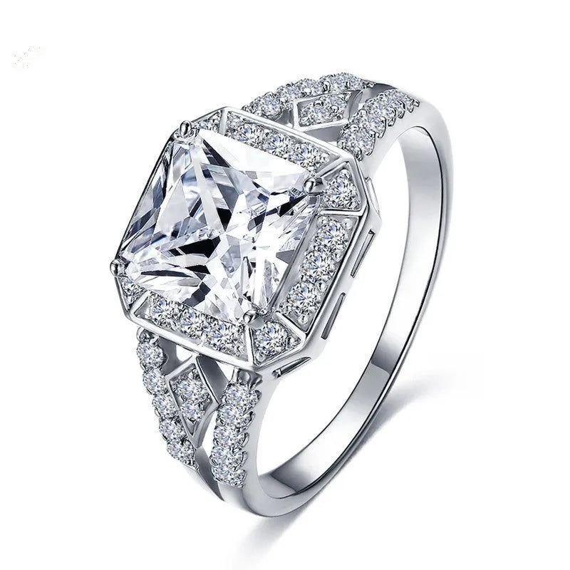 Geometric women's zircon ring with hollow ornament design in platinum colour