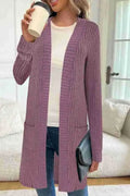 Long sleeve loose fit knitted cardigan jacket with pockets in grey.