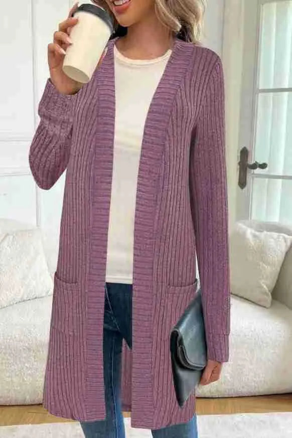 Long sleeve loose fit knitted cardigan jacket with pockets in grey.
