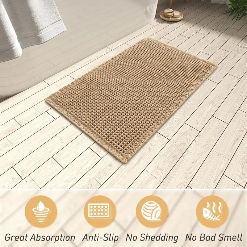 A checkered pattern polyester bathroom floor carpet showing non-slip backing.