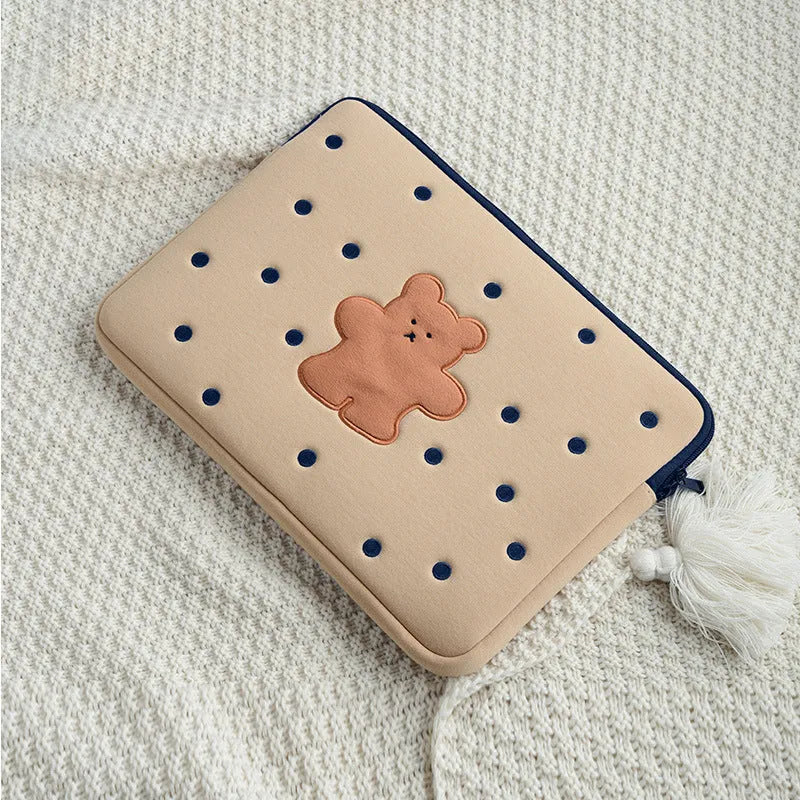 Colourful embroidered laptop sleeve with animal design for a 15.6-inch laptop.