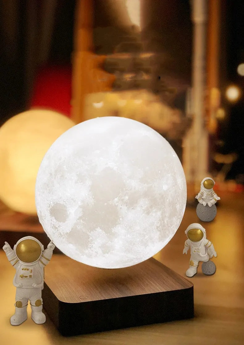 Maglev floating planet night light in a choice of colours with LED glow and USB cable.