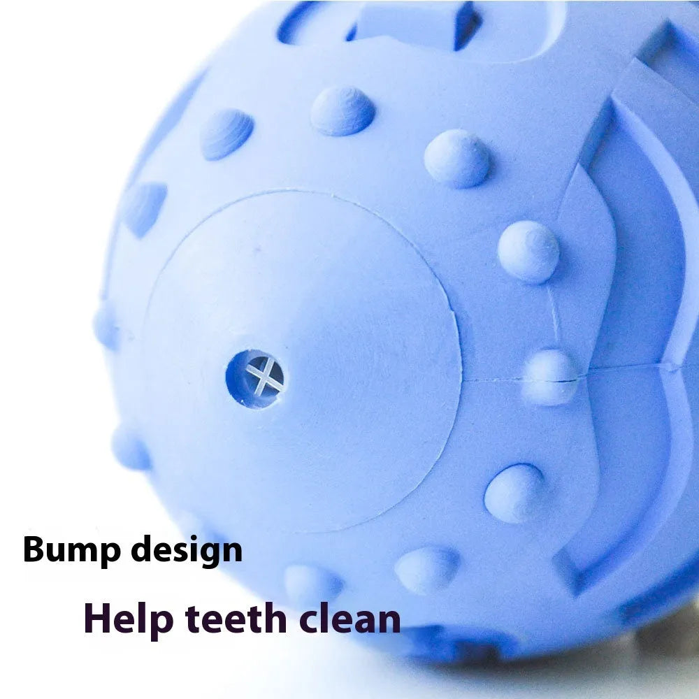Light green rugby-shaped rubber dog toy with bite-resistant texture for chewing and interactive play