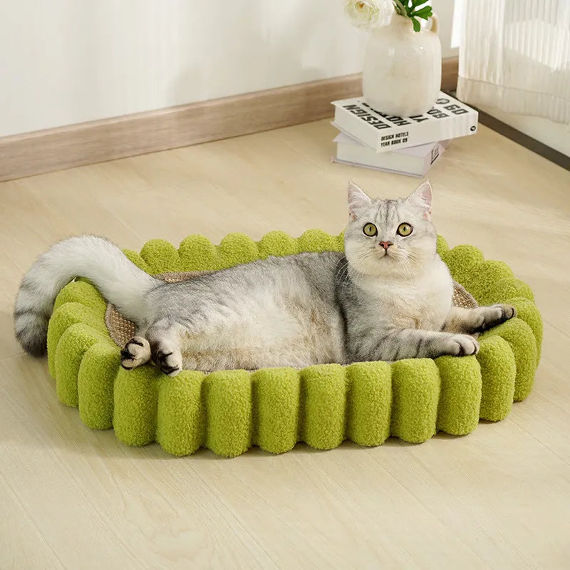 Green oval cat scratch pad bowl with sisal scratching surface measuring 650mm