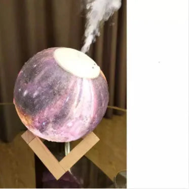 Spherical lunar humidifier night light with white LED lighting and USB charging cable