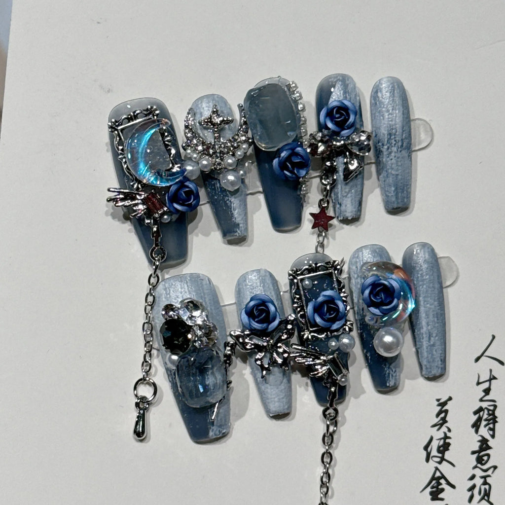 Heavy industry blue nail stickers with twinkling rose and tulip patterns for evening manicures