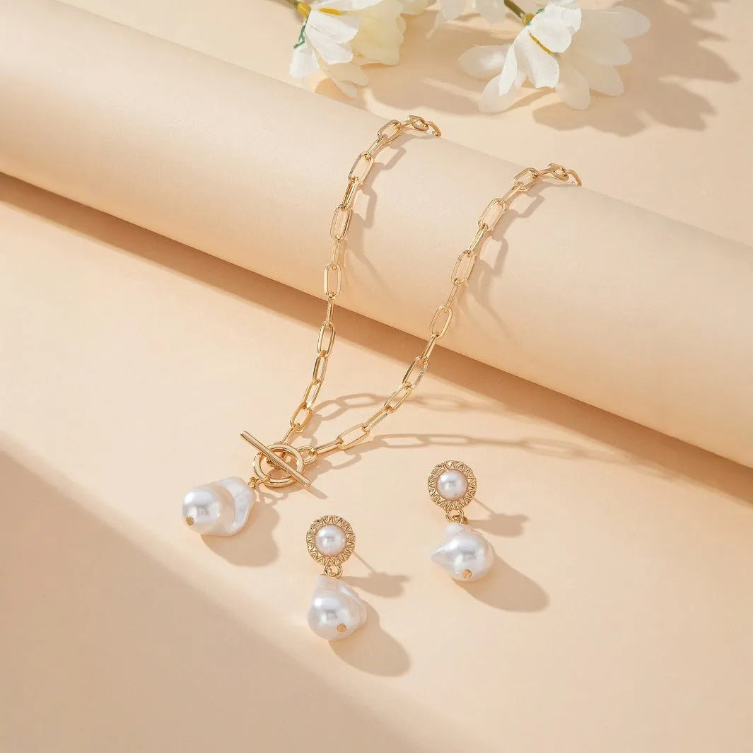 Gold baroque pearl pendant necklace and matching stud earrings jewellery set