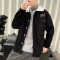 Man wearing a khaki loose-fit corduroy jacket with patch pockets
