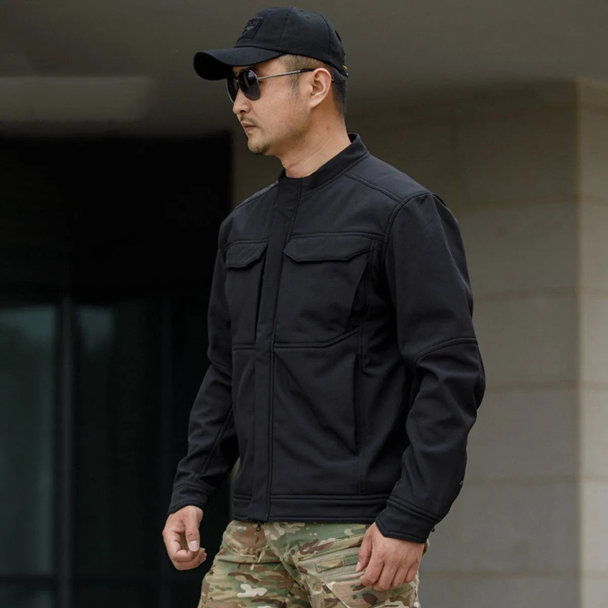Bone Frog Peak Breaker soft shell mountaineering jacket in black, shown as a cardigan-style outdoor coat.