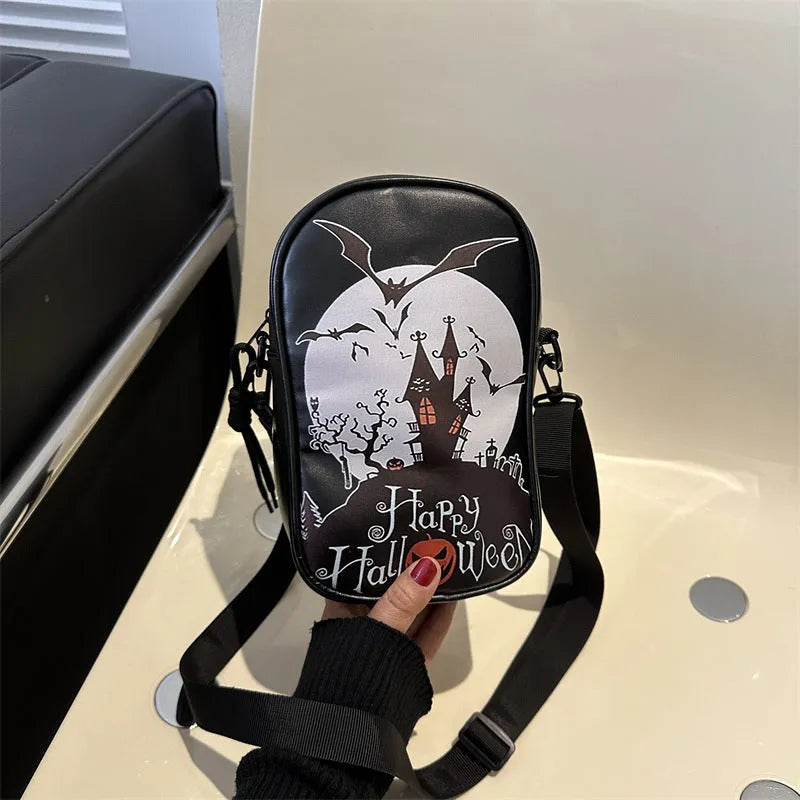 Halloween graffiti print crossbody bag with pumpkin ghost bat designs in black colour