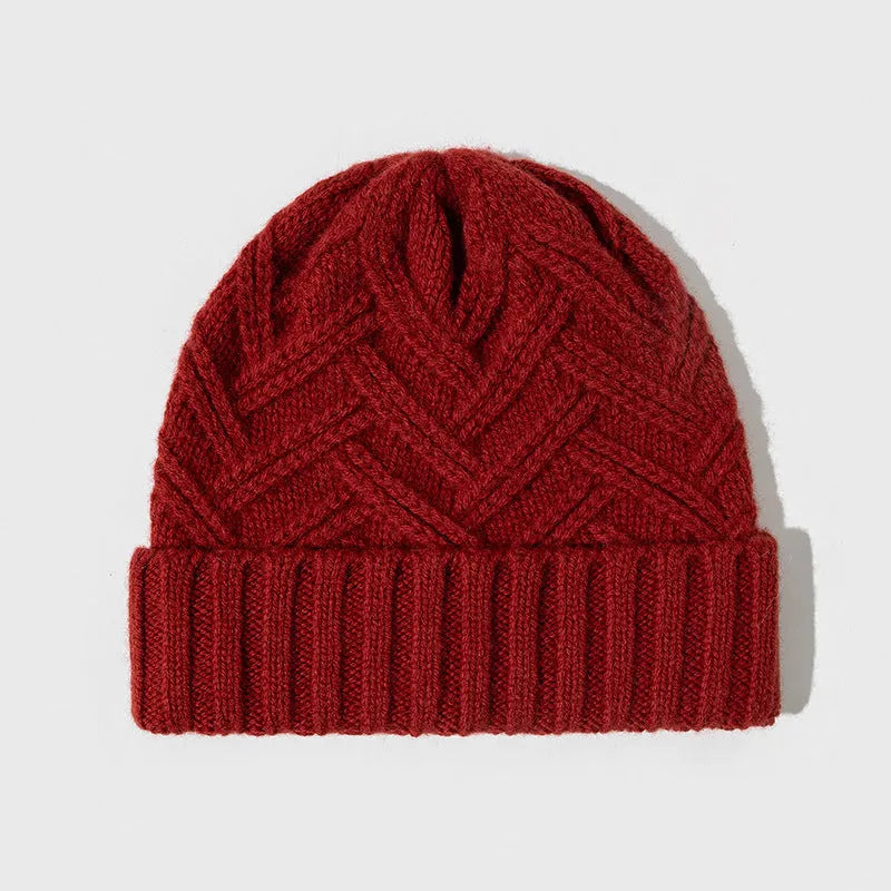 Women's wool knitted winter hat with dome crown in totem pattern, shown in ankela red colour