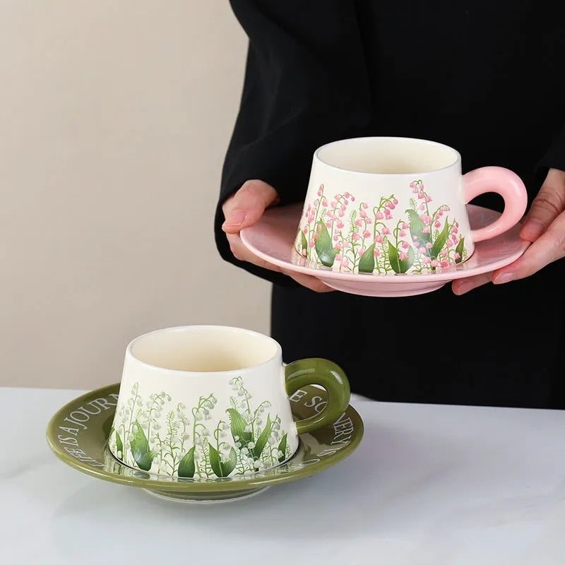 Ceramic coffee cup and saucer set for two people with two colour design options