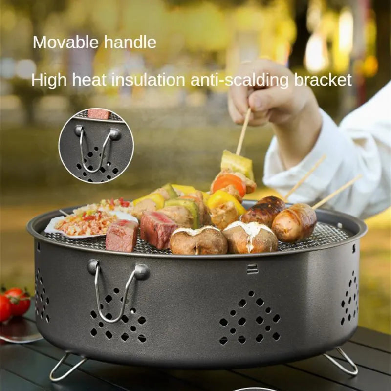 Portable stainless steel charcoal BBQ grill with detachable parts and a carry bag, shown in grey.