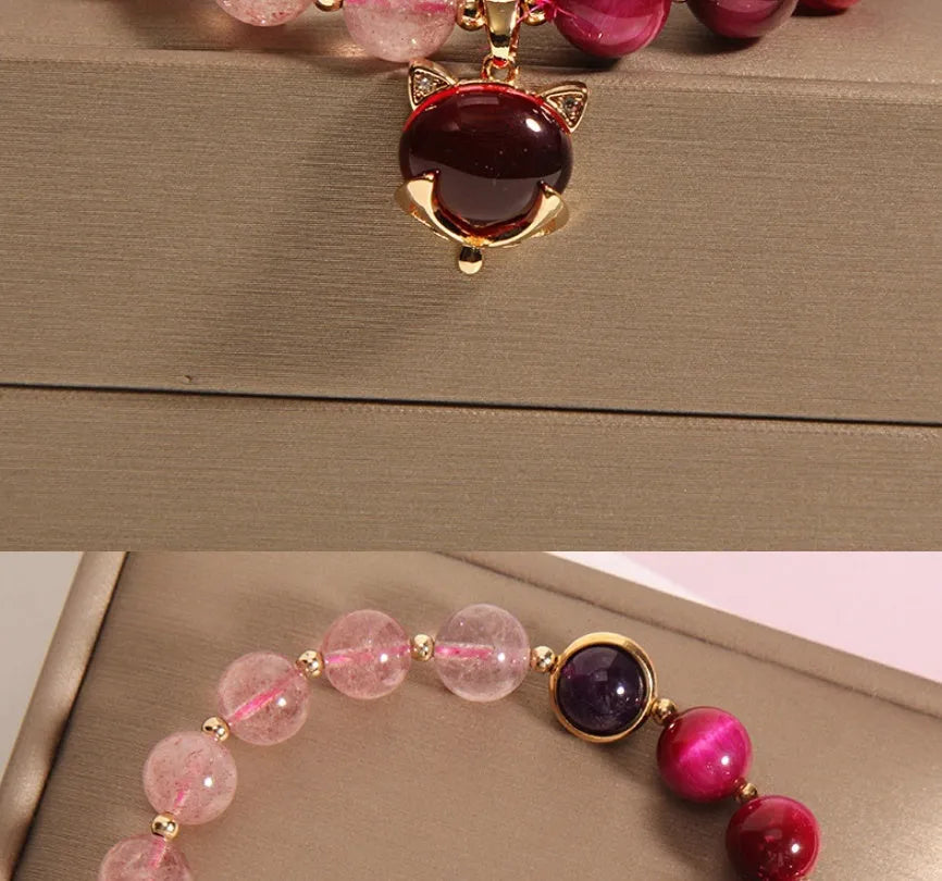 Strawberry crystal bead bracelet on elastic rope measuring 18cm with simple design