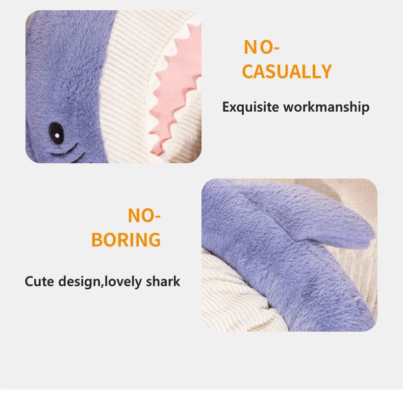 Blue shark pattern velvet pet bed for dogs or cats on a floor.