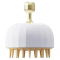 Green double-sided pet bath massage brush with drainage holes on a white background