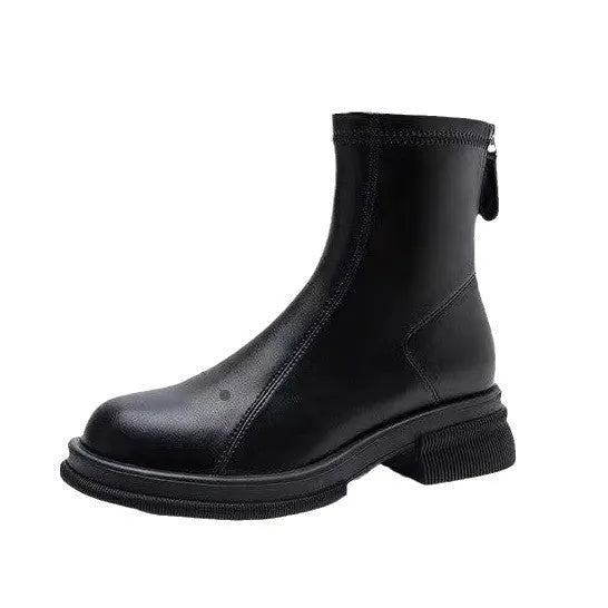Women's black ankle boots with a flat thick heel, round toe, and a back zip fastener.