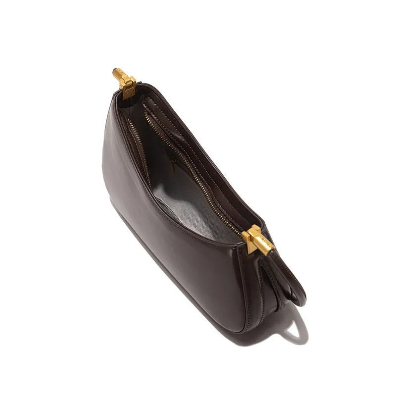 Women's oval PU leather underarm bag with single shoulder strap in seven colour options