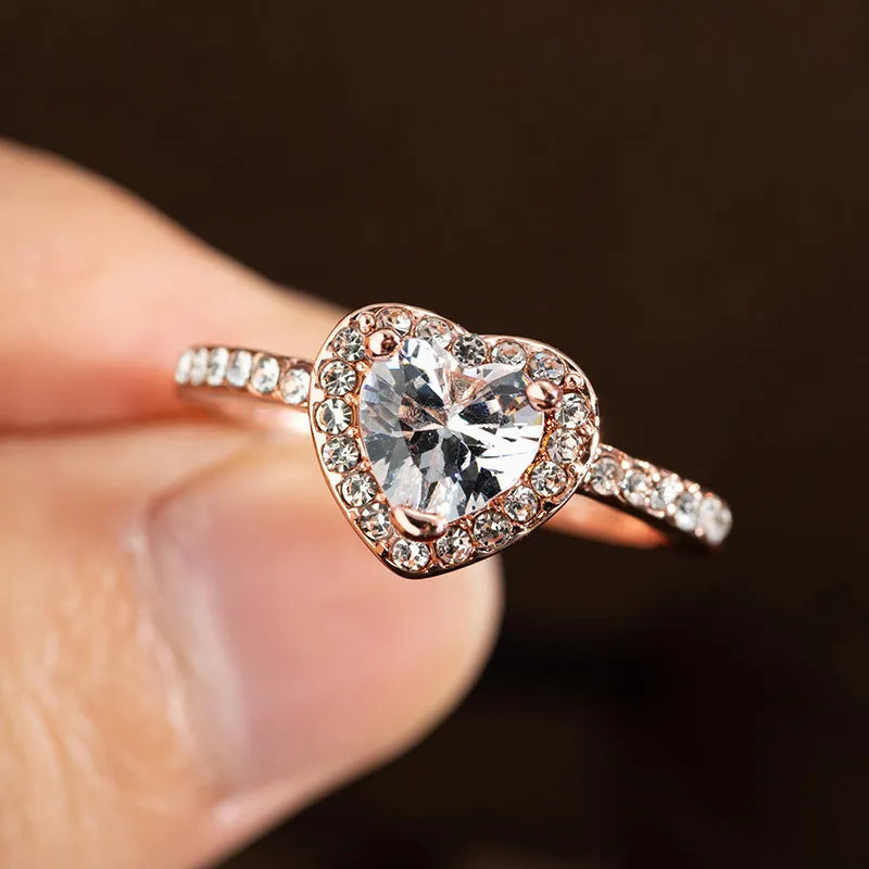Heart-shaped crystal women's wedding ring with electroplated rose gold finish on white copper band