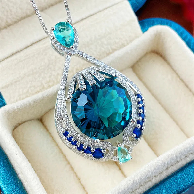 Blue geometric crystal pendant necklace with water wave chain and fireworks-cut gems