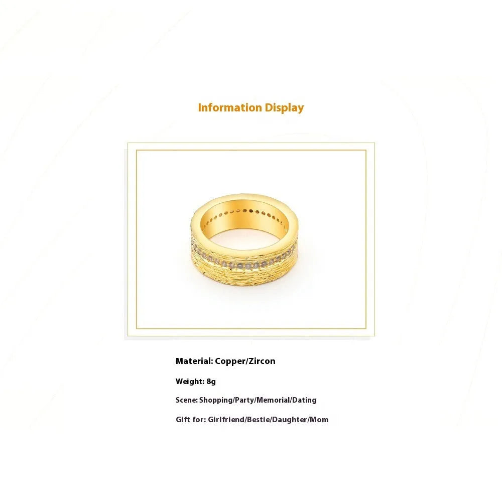 Gold geometric zircon ring on display showing angular design and available UK sizes 6-8