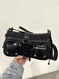 Black PU leather underarm baguette bag with an adjustable long strap.