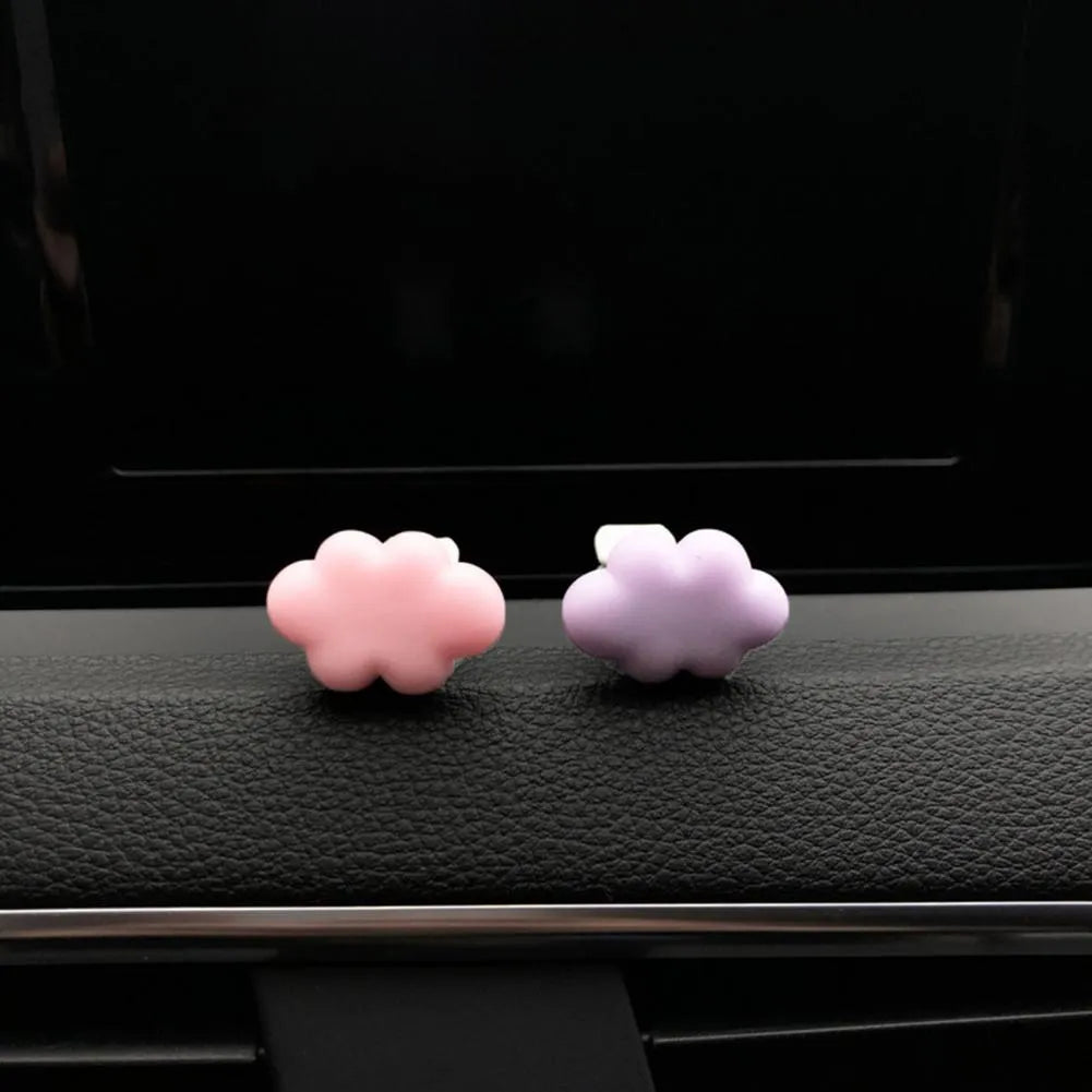 Resin Baiyun cartoon character car air vent fragrance clip in assorted colours.