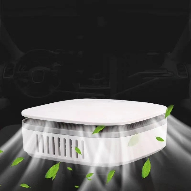 White car air purifier with USB cable and button controls for negative ion sterilisation