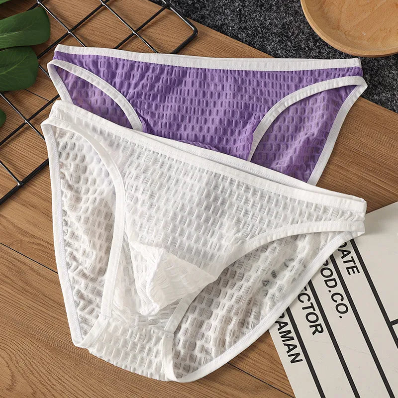 Men's low waist nylon lace underwear in light purple colour showing transparent visual design