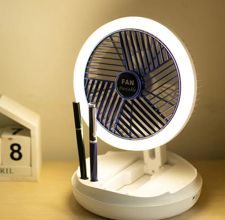 Blue foldable USB desk fan with LED light showing wall mounting bracket and pen holder